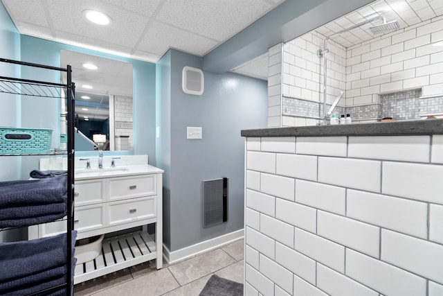 full bath featuring tile patterned floors, visible vents, vanity, and walk in shower