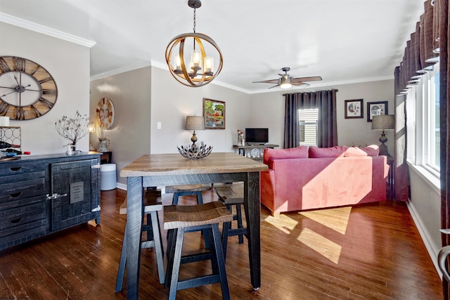 dining area with baseboards, ornamental molding, wood finished floors, and ceiling fan with notable chandelier