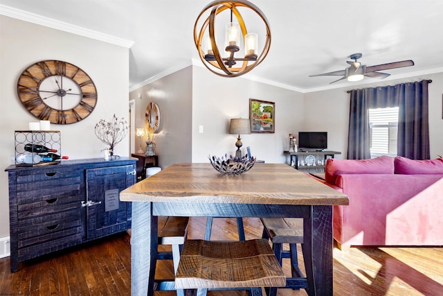 dining space featuring ceiling fan with notable chandelier, ornamental molding, dark wood finished floors, and visible vents