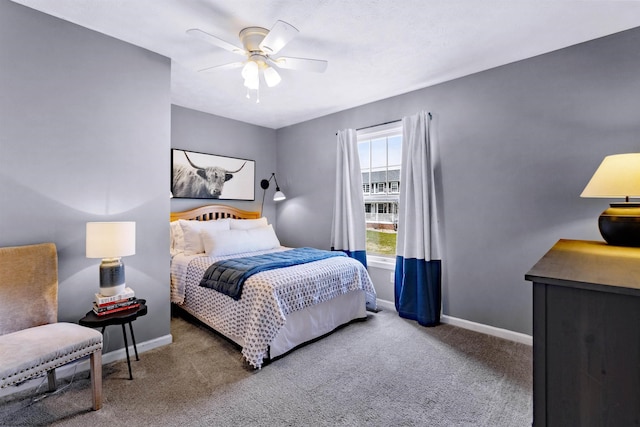 bedroom featuring carpet floors, baseboards, and a ceiling fan