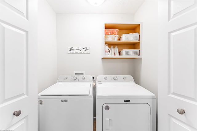 laundry area with laundry area and washing machine and dryer