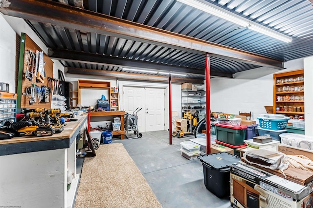 garage with a workshop area