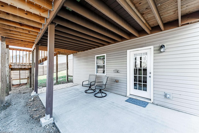 view of patio / terrace featuring fence