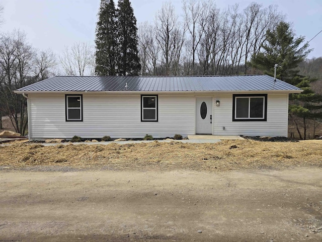 view of front of property with metal roof