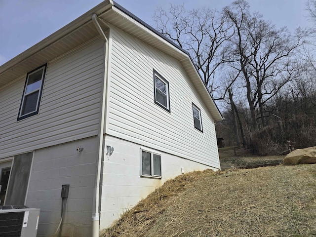 view of side of home with cooling unit