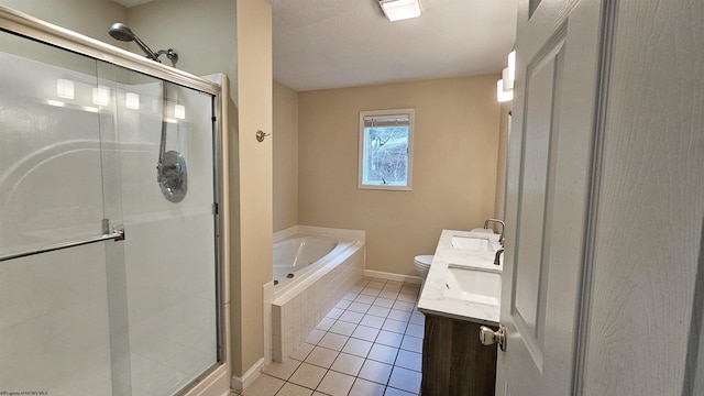 bathroom with tile patterned flooring, a garden tub, a shower stall, and vanity