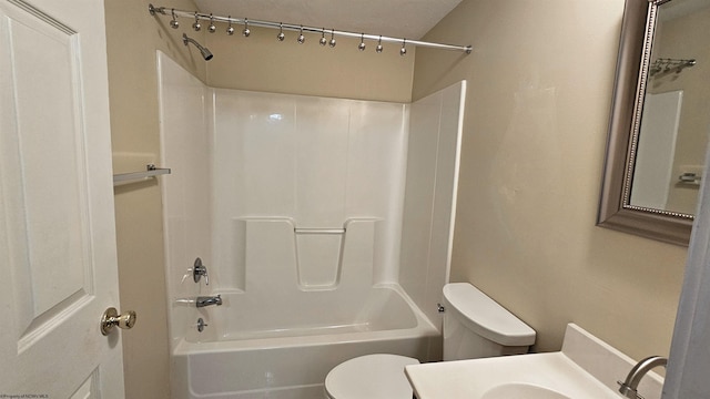 full bath featuring toilet,  shower combination, and vanity