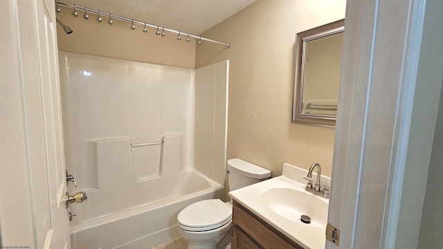 full bathroom with vanity, bathtub / shower combination, and toilet