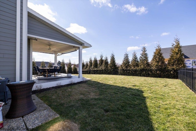 view of yard featuring ceiling fan, a patio, and fence private yard