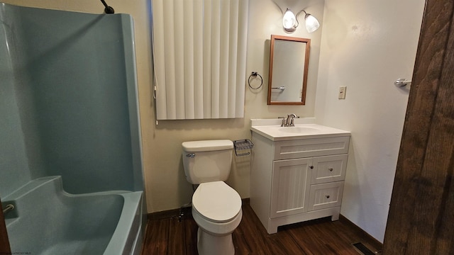 full bathroom with toilet, wood finished floors, visible vents, and baseboards