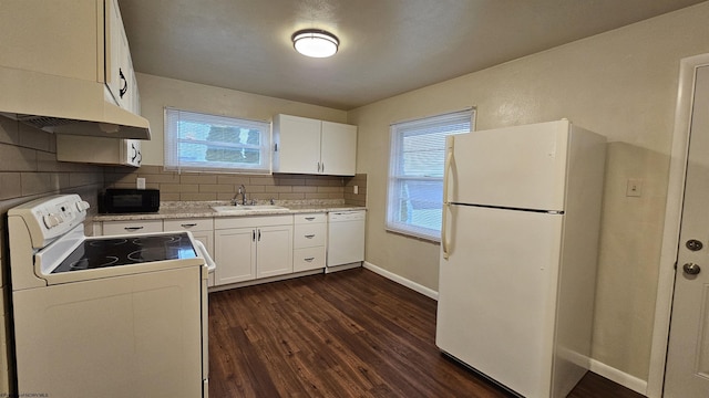 kitchen featuring backsplash, dark wood-type flooring, a sink, white appliances, and under cabinet range hood