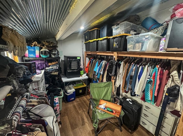 walk in closet featuring wood finished floors