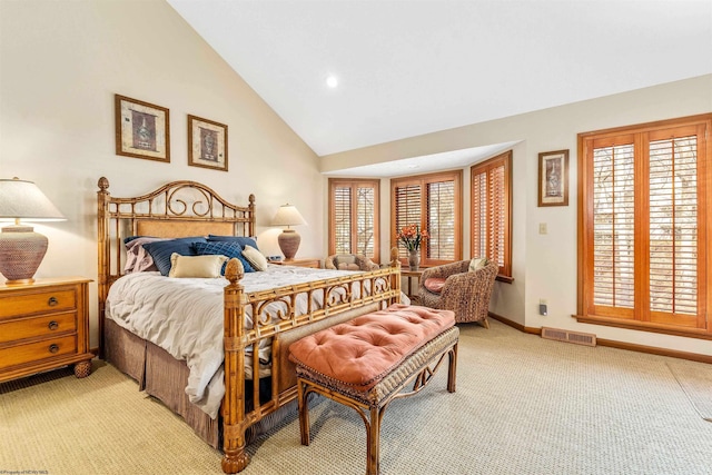 bedroom with baseboards, multiple windows, visible vents, and light colored carpet