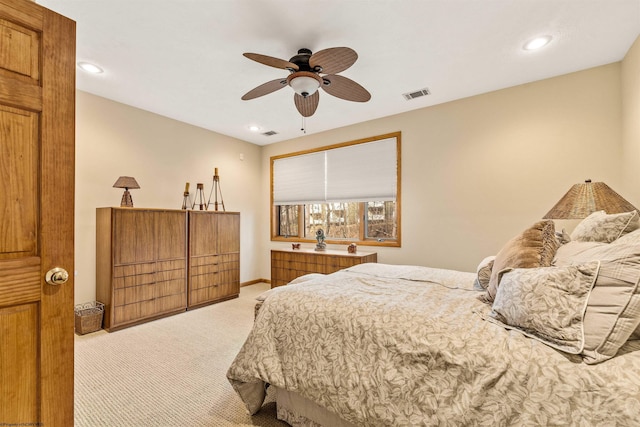 bedroom featuring recessed lighting, visible vents, ceiling fan, and light carpet