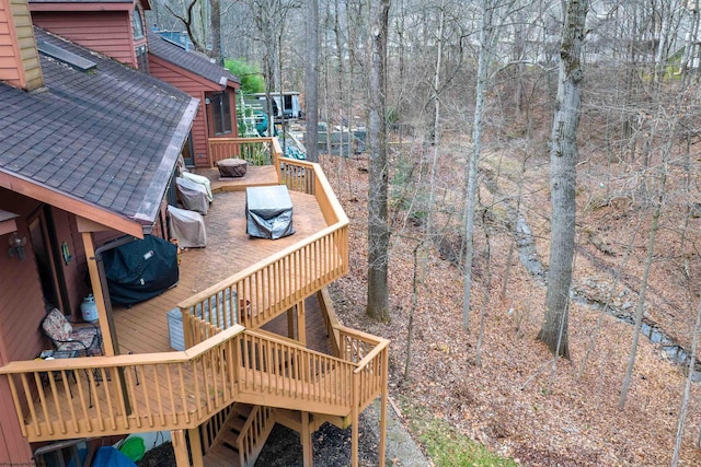 exterior space featuring a wooden deck