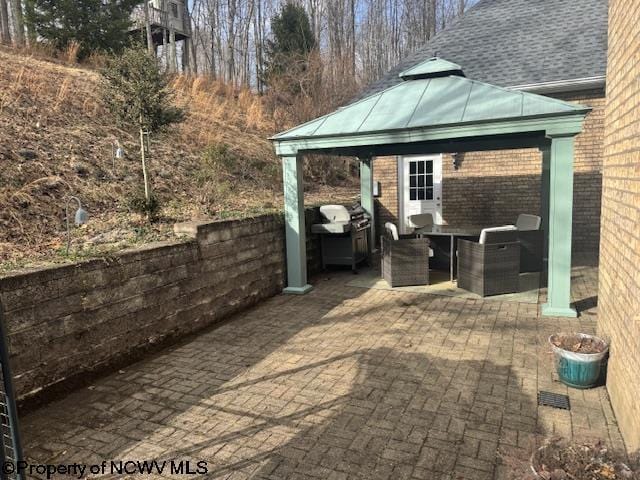 view of patio with a gazebo and area for grilling