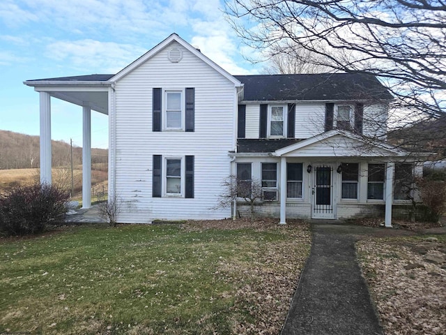 traditional home with a front lawn