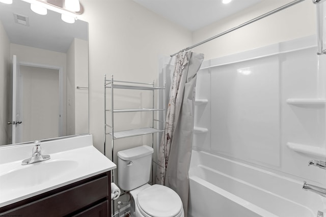 full bathroom featuring toilet, shower / tub combo, vanity, and visible vents