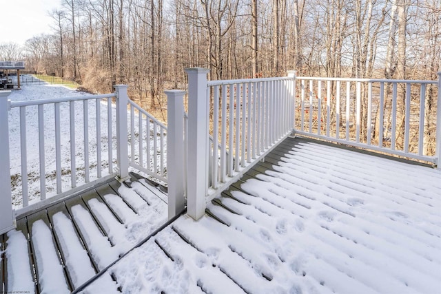 view of snow covered deck