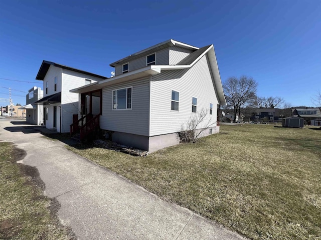 view of home's exterior featuring a yard