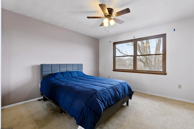 bedroom featuring carpet, ceiling fan, and baseboards