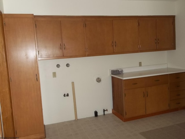 washroom with hookup for a gas dryer