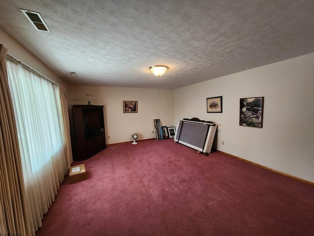 168 Locust Heights Dr, Clarksburg, WV 26301 - carpeted empty room with baseboards, visible vents, and a textured ceiling