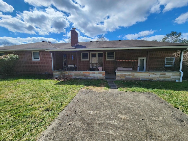 168 Locust Heights Dr, Clarksburg, WV 26301 - rear view of property with a patio, a chimney, brick siding, and crawl space