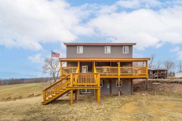 exterior space featuring stairs and a deck