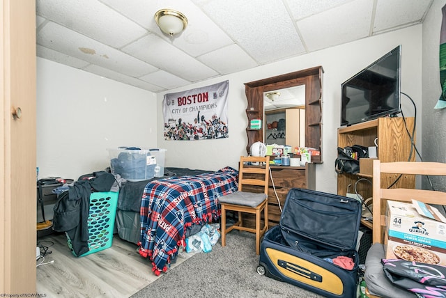 bedroom with a paneled ceiling