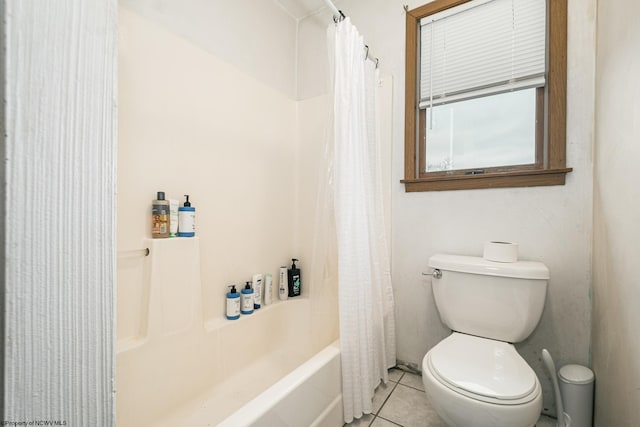 full bathroom with tile patterned flooring, toilet, and shower / bath combo