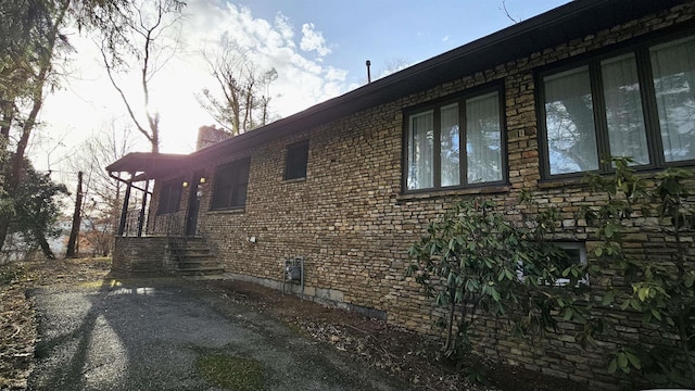 view of home's exterior with a chimney