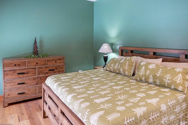 bedroom featuring light wood finished floors