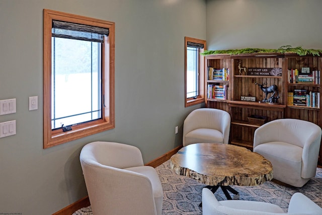 sitting room featuring baseboards