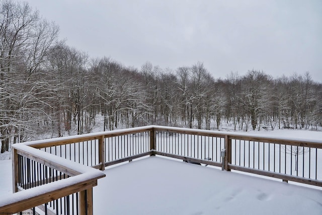 view of snow covered deck