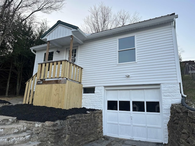 exterior space with an attached garage