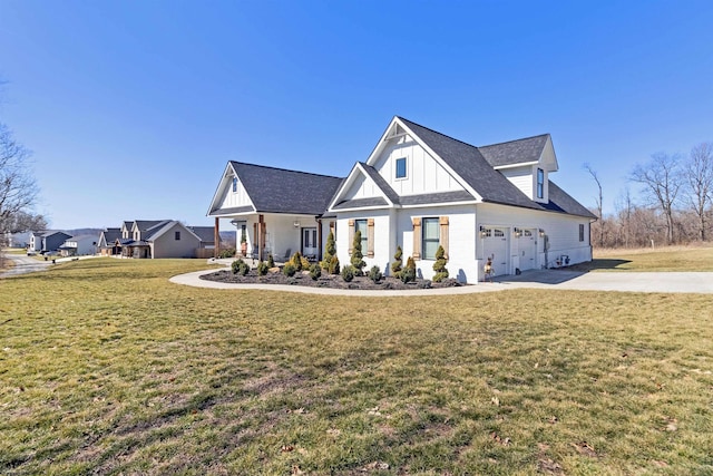 modern inspired farmhouse featuring concrete driveway, board and batten siding, and a front lawn