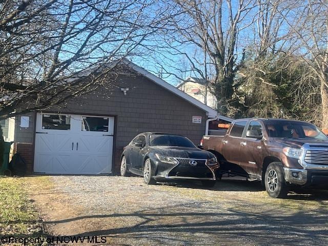 view of property exterior featuring dirt driveway