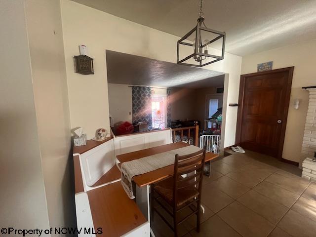 15401/2 Country Club Rd, Fairmont, WV 26554 - tiled dining space with a chandelier