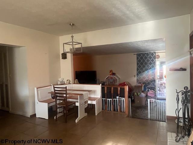 15401/2 Country Club Rd, Fairmont, WV 26554 - tiled dining area featuring a chandelier