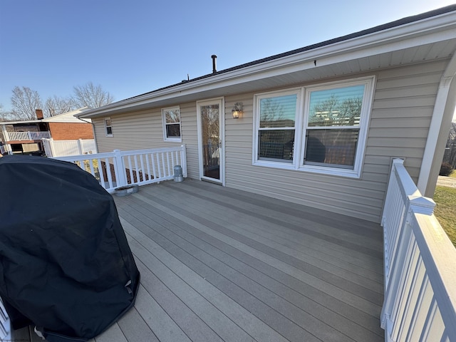 deck featuring a grill