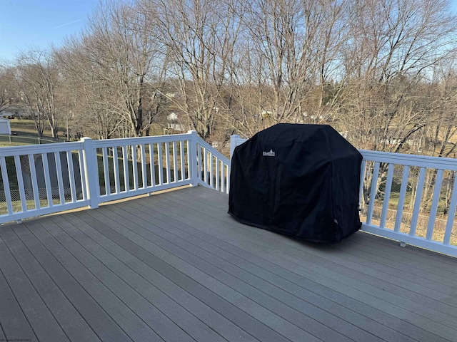 wooden terrace featuring grilling area