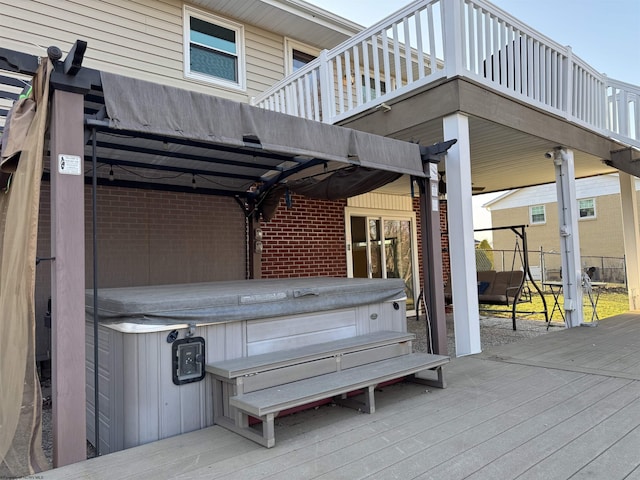 deck with a hot tub