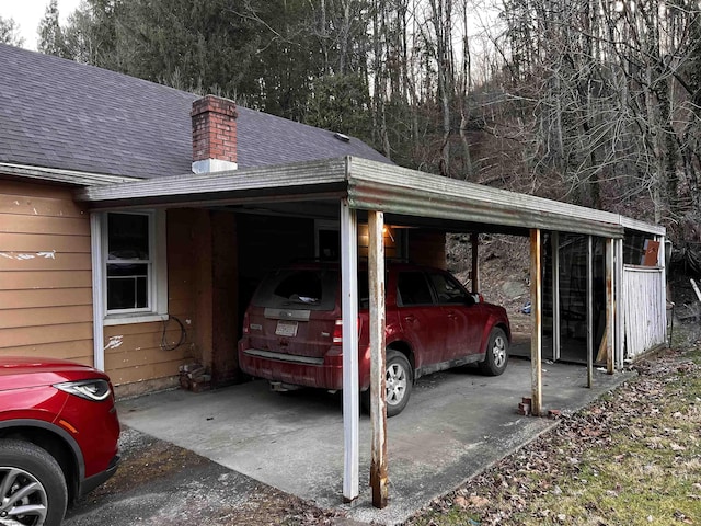 view of parking with a carport