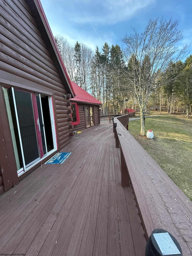 wooden deck with a yard