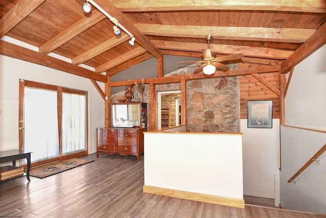 kitchen featuring lofted ceiling with beams, wood finished floors, wooden ceiling, rail lighting, and ceiling fan