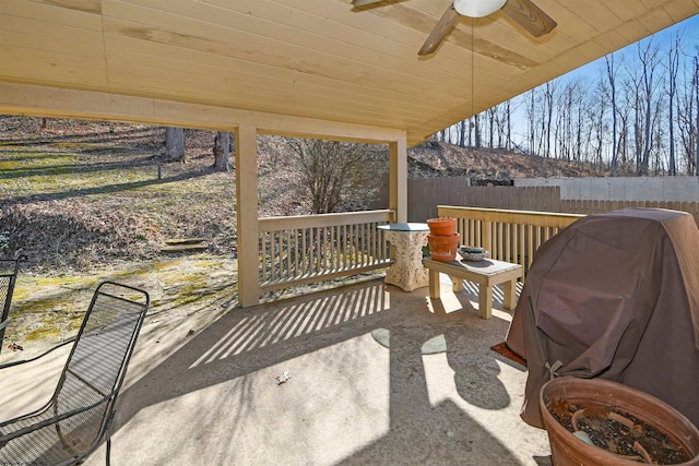 view of patio / terrace featuring grilling area, a ceiling fan, and fence