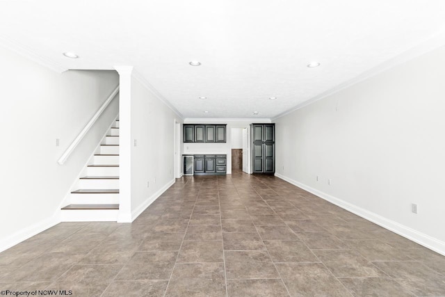 unfurnished living room featuring stairs, recessed lighting, baseboards, and ornamental molding