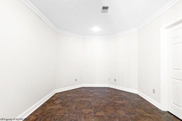 unfurnished room featuring stone finish floor, baseboards, and ornamental molding