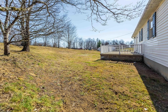 view of yard with a deck